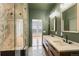 Modern bathroom with dual vanities, a walk-in shower, marble floors, and views from the shower at 2680 Blake St # 4, Denver, CO 80205
