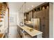 Modern kitchen featuring an island with seating and sleek stainless steel appliances at 2680 Blake St # 4, Denver, CO 80205