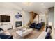 Inviting living room with fireplace, stylish furnishings, and bright natural light for relaxed comfort at 2680 Blake St # 4, Denver, CO 80205