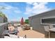 Inviting rooftop deck features comfortable seating, a fire pit, and city views, perfect for entertaining at 2680 Blake St # 4, Denver, CO 80205