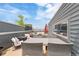 Relax on the expansive rooftop deck with outdoor seating, fire pit, and views of the surrounding city at 2680 Blake St # 4, Denver, CO 80205