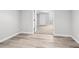 Entry to a bedroom with neutral walls, light flooring and a walk-in closet at 801 S Harrison St, Denver, CO 80209