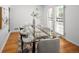 Stylish dining area showcasing a glass table, contemporary chairs, and elegant decor accents at 801 S Harrison St, Denver, CO 80209