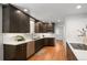 Updated kitchen featuring white countertops and stainless steel appliances at 801 S Harrison St, Denver, CO 80209
