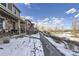 Front walkway leading to charming townhome entrance at 10246 Tall Oaks Cir, Parker, CO 80134