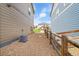 View of the backyard showing a rock garden and the rear of neighboring homes at 7465 E 157Th Pl, Thornton, CO 80602
