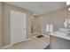 Neutral bathroom featuring a large walk-in shower with glass doors and a white vanity at 7465 E 157Th Pl, Thornton, CO 80602