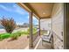 Charming front porch with seating area at 7465 E 157Th Pl, Thornton, CO 80602