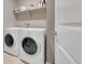 Laundry room featuring a pair of white washer and dryer units at 7465 E 157Th Pl, Thornton, CO 80602