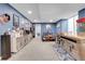 Finished basement boasts recreational space with vinyl records, a bar, and a bathroom at 9868 Olathe St, Commerce City, CO 80022