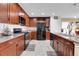 Stylish kitchen featuring modern appliances, granite countertops, and ample cabinetry at 9868 Olathe St, Commerce City, CO 80022