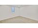 Unfurnished basement provides a blank canvas for customization with carpeted floors and a small window at 1226 W 98Th Ave, Northglenn, CO 80260