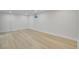 Finished basement with sleek wood-look floors and a single window for natural light at 1226 W 98Th Ave, Northglenn, CO 80260