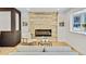 Cozy living room features a modern fireplace and stylish decor at 1226 W 98Th Ave, Northglenn, CO 80260