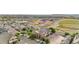 Scenic aerial view of a new construction community with modern townhomes and landscaped grounds at 23456 E 5Th Pl # 104, Aurora, CO 80018