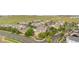 Aerial view of a townhome community highlighting the landscaped common areas and easy street access at 23456 E 5Th Pl # 104, Aurora, CO 80018
