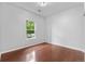 Bedroom with hardwood floors and a window view at 23456 E 5Th Pl # 104, Aurora, CO 80018