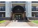 Building entrance at 345 Fillmore features covered awning and seating at 345 Fillmore St # 409, Denver, CO 80206