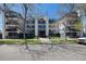 Attractive four-story apartment building with manicured landscaping and well-maintained exterior at 345 Fillmore St # 409, Denver, CO 80206