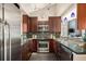 A well-equipped kitchen featuring granite countertops and stainless steel appliances at 345 Fillmore St # 409, Denver, CO 80206