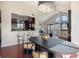 Open-concept living space featuring a kitchen view, cathedral ceilings and an open dining space at 345 Fillmore St # 409, Denver, CO 80206