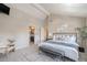 Spacious main bedroom with ensuite bath and views offers a bright and airy feel at 345 Fillmore St # 409, Denver, CO 80206
