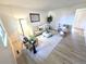 Bright living room featuring modern decor, stylish furnishings, and ample natural light at 5721 W 92Nd Ave # 66, Westminster, CO 80031