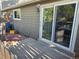 Home exterior with a sliding glass door to a patio area, showcasing outdoor living potential at 5721 W 92Nd Ave # 66, Westminster, CO 80031