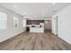 Inviting kitchen and living area with modern appliances and a comfortable layout at 2668 Simpson Ln, Erie, CO 80026
