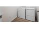 Convenient laundry room with modern washer and dryer units, designed for efficiency at 2668 Simpson Ln, Erie, CO 80026