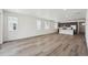 Bright and airy living space with large windows and seamless kitchen integration at 2668 Simpson Ln, Erie, CO 80026