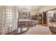 Luxurious bathroom with a large soaking tub, glass block shower, and fireplace at 187 Fox Ridge Dr, Evergreen, CO 80439