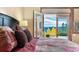 Bedroom with mountain views and private deck access at 187 Fox Ridge Dr, Evergreen, CO 80439