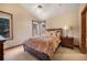 Spacious bedroom with a queen-size bed and mountain views at 187 Fox Ridge Dr, Evergreen, CO 80439