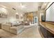 Media room featuring a stone fireplace and sectional sofa at 187 Fox Ridge Dr, Evergreen, CO 80439