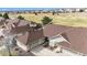 Aerial view of homes with well-maintained lawns and easy access to the golf course at 7683 S Biloxi Way, Aurora, CO 80016