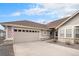 Charming single-story home with a two-car garage, tidy landscaping, and a welcoming front entrance at 7683 S Biloxi Way, Aurora, CO 80016
