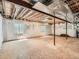Unfinished basement space ready for customization with exposed beams and ductwork at 1649 Iris St, Broomfield, CO 80020
