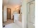 Bright bathroom featuring a bathtub, a glass-enclosed shower, and a well-lit vanity at 1649 Iris St, Broomfield, CO 80020