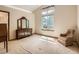 Bedroom featuring a large window, vaulted ceiling and natural light at 1649 Iris St, Broomfield, CO 80020