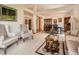 Spacious living area with high ceilings, neutral carpet, and a combined formal dining space at 1649 Iris St, Broomfield, CO 80020