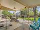 Covered patio area with comfortable seating, perfect for outdoor relaxation at 1649 Iris St, Broomfield, CO 80020