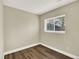 Bedroom with hardwood floors and a window that provides ample natural light at 19897 E Brunswick Dr, Aurora, CO 80013