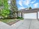 Well-maintained single-Gathering home with a spacious driveway and manicured front yard at 19897 E Brunswick Dr, Aurora, CO 80013