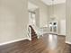 Open-concept living space with staircase, and access to the outdoor deck at 19897 E Brunswick Dr, Aurora, CO 80013