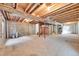 Unfinished basement space with exposed beams and ducts, concrete walls, and concrete floor at 11963 Dahlia Dr, Thornton, CO 80233