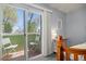 Private balcony with seating, accessible from the bedroom, offering views of the surrounding greenery and natural light at 3228 W Girard Ave # C, Englewood, CO 80110