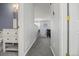 Bright bathroom with a white vanity, gray walls and modern fixtures at 3228 W Girard Ave # C, Englewood, CO 80110