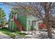Charming two-story home with a private entrance and lush landscaping surrounding the property at 3228 W Girard Ave # C, Englewood, CO 80110