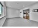 Finished basement with carpeting, large window, and media connection at 8179 S Kellerman Cir, Aurora, CO 80016